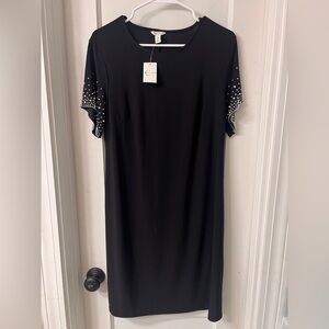 Black dress with embellished sleeves